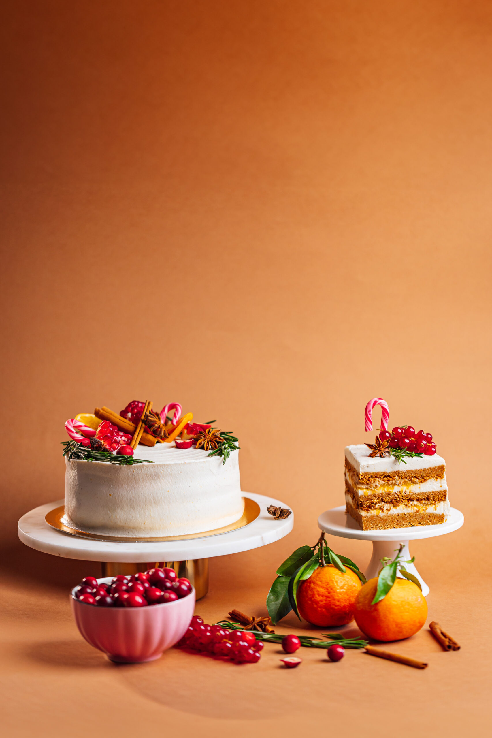 Delicious cake adorned with fresh fruit and spices creating a festive atmosphere